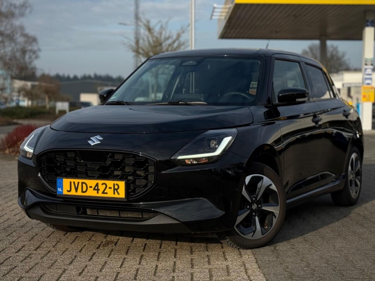 Suzuki Swift - 1.2 STYLE SMART HYBR. KEYLESS ECC CAMERA NAVI ADD. CRUISE - AutoWereld.nl