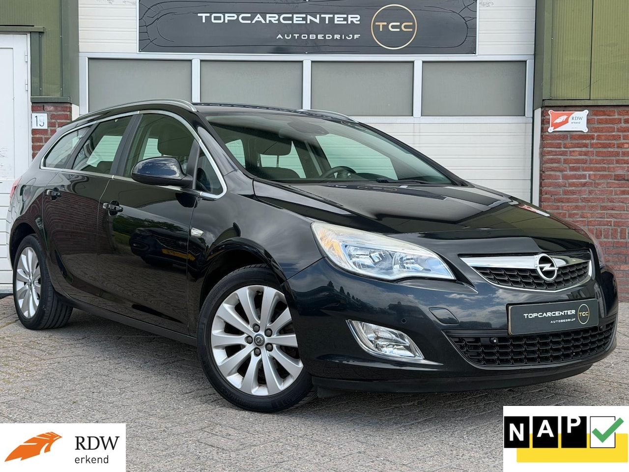 Opel Astra Sports Tourer - 1.4 Cosmo/AIRCO/NAVI/PARKS/APK/NAP - AutoWereld.nl