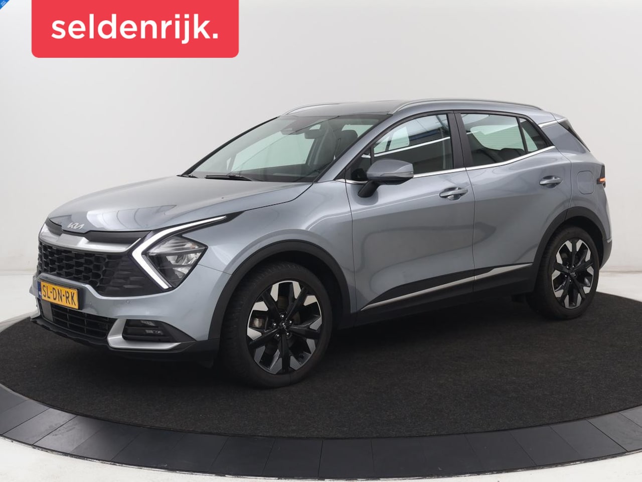 Kia Sportage - 1.6 T-GDi Plug-in Hybrid AWD DynamicLine | SOH 97,2% | Camera | Carplay | Adaptive cruise - AutoWereld.nl