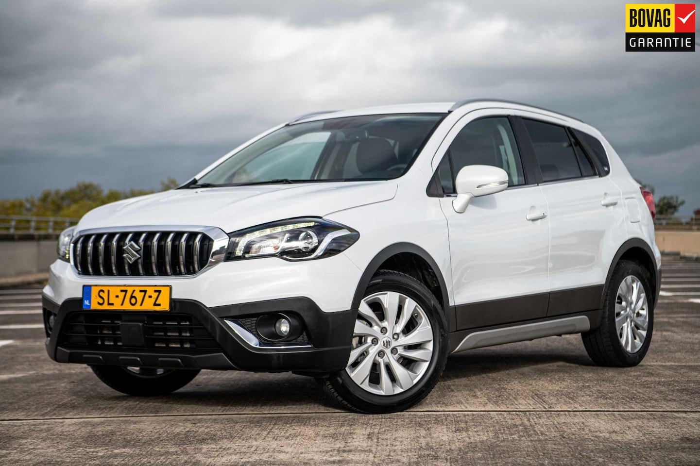 Suzuki S-Cross - 1.0 Boosterjet Exclusive | Airco/Clima | Trekhaak | Achteruitrijcamera | LM Velgen | Stoel - AutoWereld.nl