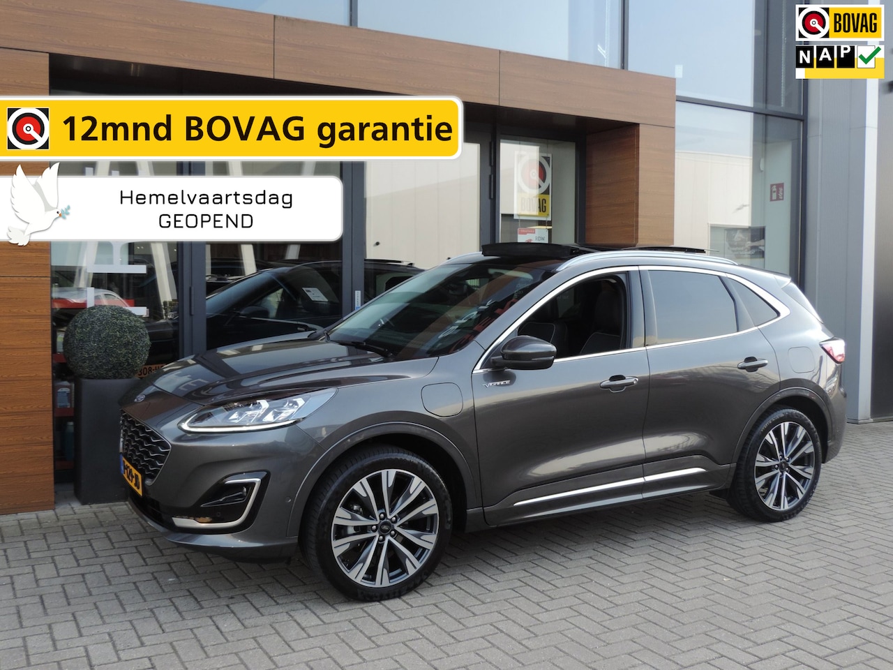 Ford Kuga - 2.5 PHEV Vignale 225PK 79.000km | NLauto | 1e Eig | Pano | ECC | Winterpack | Leer | 20” | - AutoWereld.nl