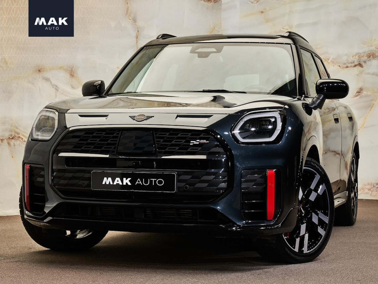 MINI Countryman - 2.0 JCW ALL4 John Cooper Works XL 2.0 JCW ALL4 John Cooper Works XL, pano, 20", H/K, memory, massage, HUD, ACC, privacy - AutoWereld.nl