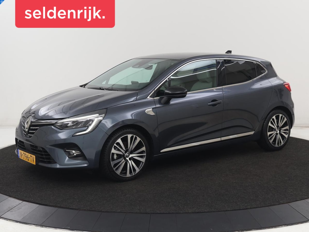 Renault Clio - 1.6 E-Tech Hybrid 140 Initiale Paris | Leder | Stoelverwarming | Carplay | Keyless | Park - AutoWereld.nl