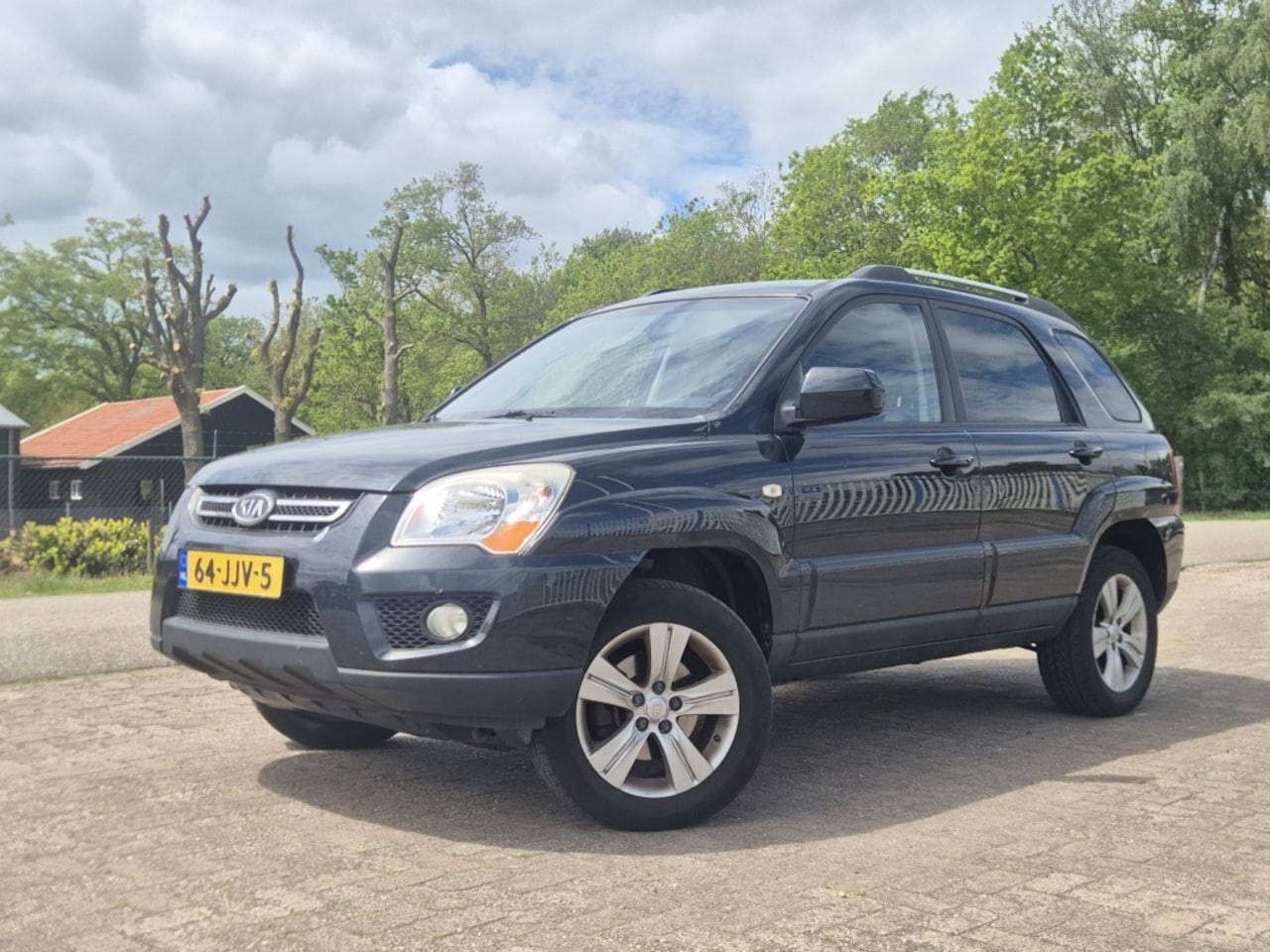Kia Sportage - 2.0 CVVT X-tra 2.0 CVVT X-tra - AutoWereld.nl