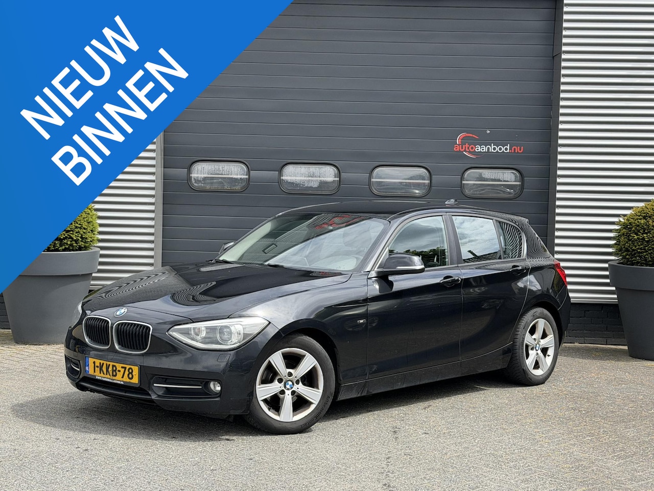 BMW 1-serie - 116d EDE Business Sport | Navigatie | Xenon | Sport Stoelen | Climate Control | Lichtmetal - AutoWereld.nl