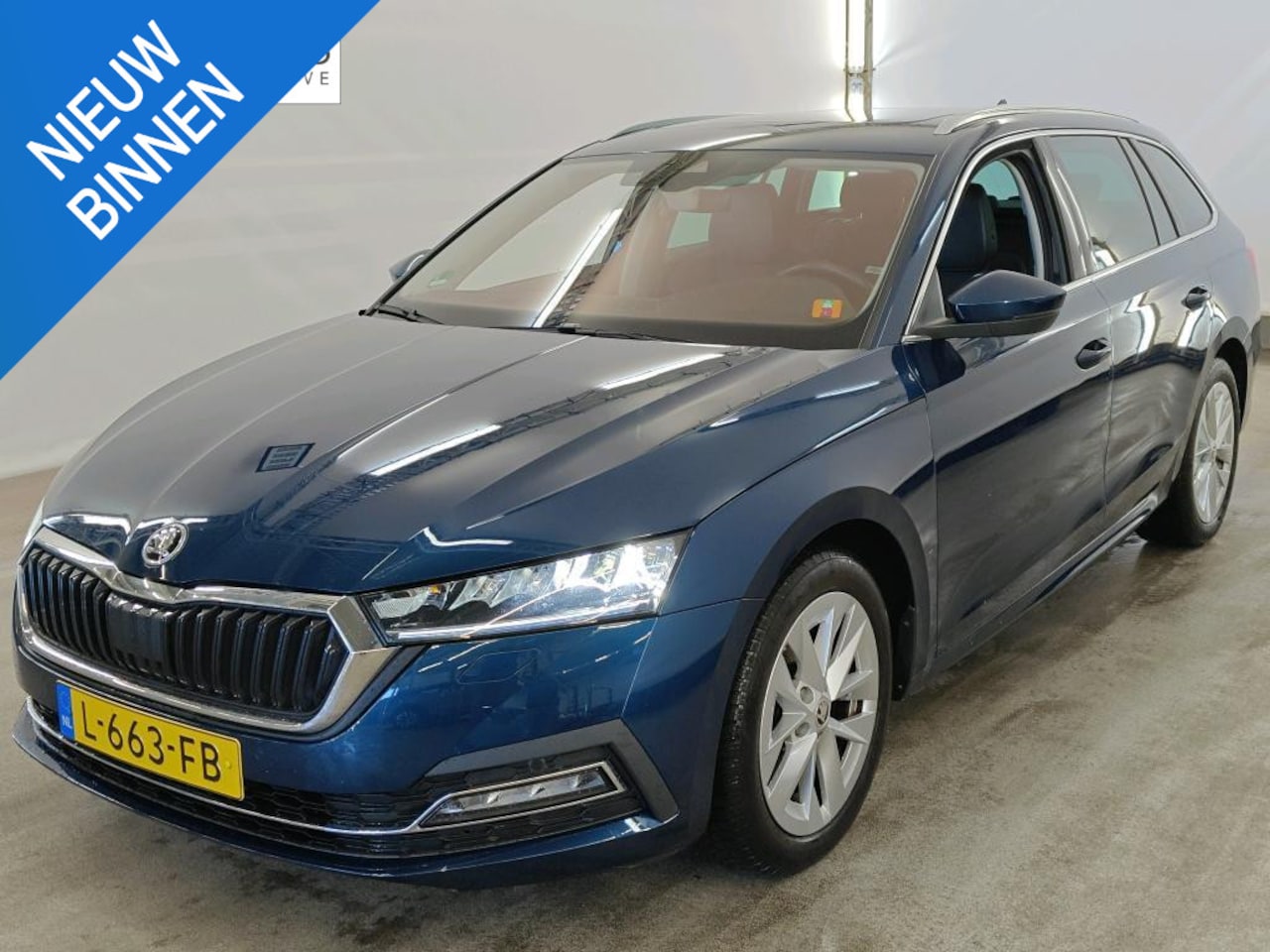 Skoda Octavia Combi - 1.0 e-TSI Business Edition Plus NL-AUTO | PANODAK | LEDER | CAMERA - AutoWereld.nl