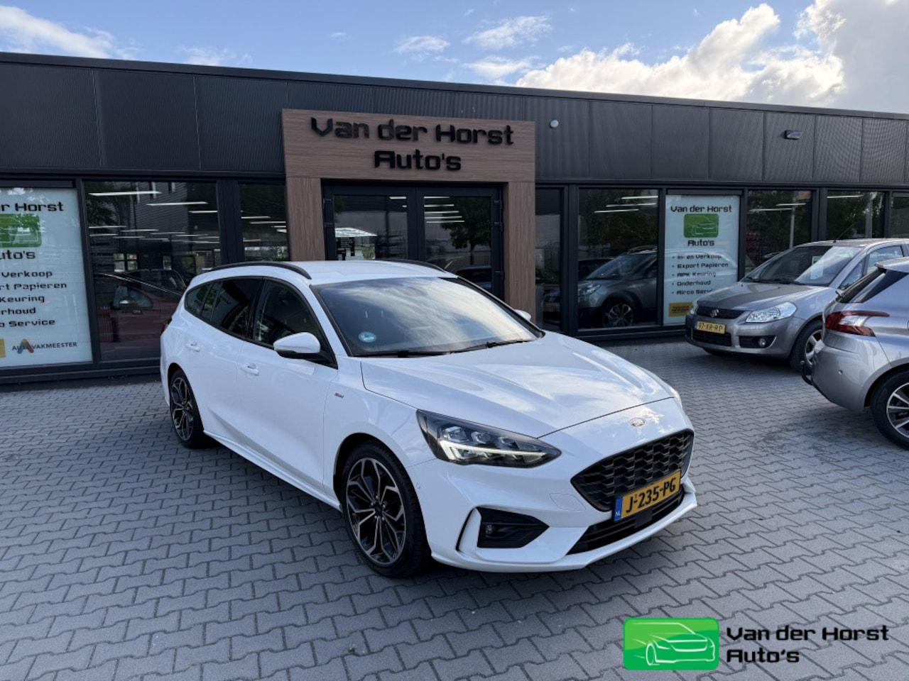 Ford Focus Wagon - 1.0 EcoBoost Hybrid ST Line Navi - AutoWereld.nl