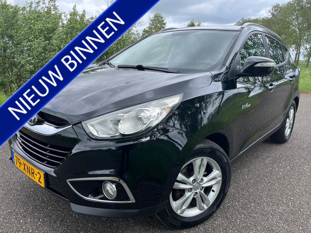 Hyundai ix35 - 1.6i GDI Business Edition 1.6i GDI Business Edition - AutoWereld.nl