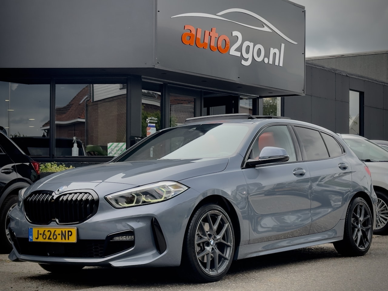 BMW 1-serie - 118i AUT7 M-SPORT HIGH EXECUTIVE EDITION PANODAK DESIGNO-SPORTLEDER NAVI CAMERA DIGI-DASH - AutoWereld.nl