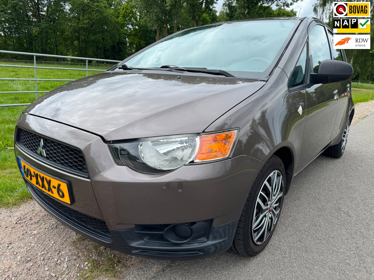 Mitsubishi Colt - 1.1 Edition One top onderhouden - AutoWereld.nl