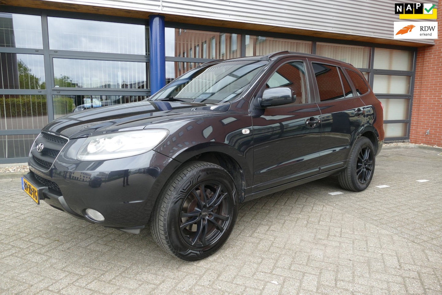 Hyundai Santa Fe - 2.7i V6 Dynamic 7pers APK 1-2027 Dealer Oh - AutoWereld.nl