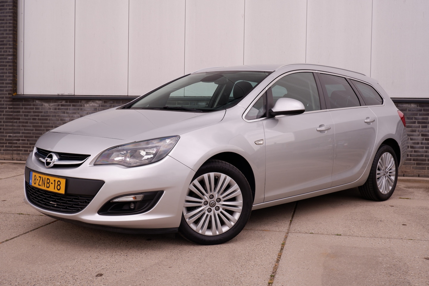 Opel Astra Sports Tourer - 1.4 Turbo Design Edition | Navi | Climate | Cruise | PDC | - AutoWereld.nl