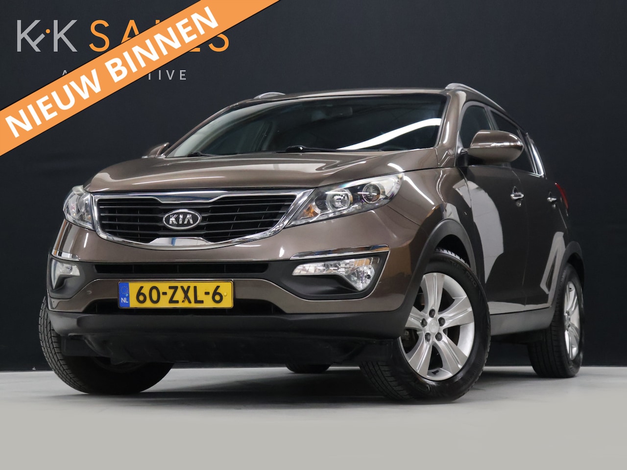 Kia Sportage - 1.6 GDI Plus Pack [TREKHAAK, APPLE CARPLAY, CLIMATE CONTROL, CRUISE, MULTIFUNCTIONEEL STUU - AutoWereld.nl