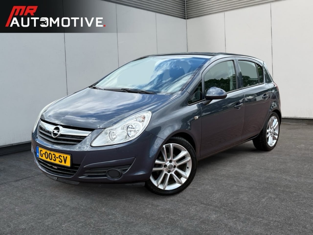 Opel Corsa - 1.2-16V Cosmo - Navi, Airco, Lichtmetaal - AutoWereld.nl