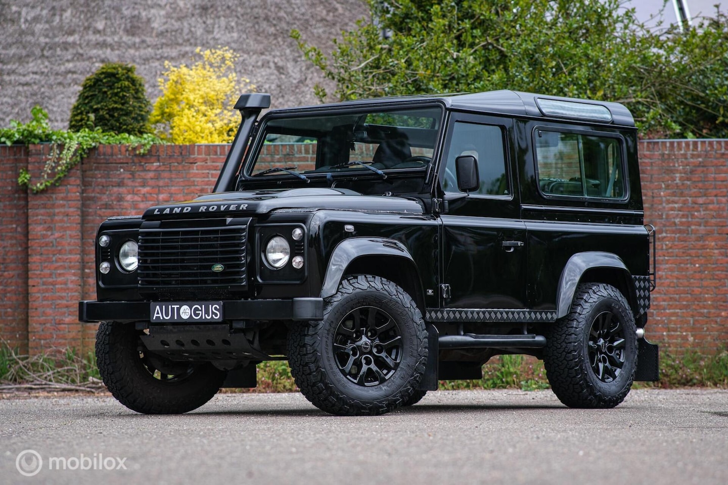 Land Rover Defender 90 - 2.4 TD | 4 pers | comfort stoelen | Airco | Stoelverwarming | Leder | Snorkel | Voorruitve - AutoWereld.nl