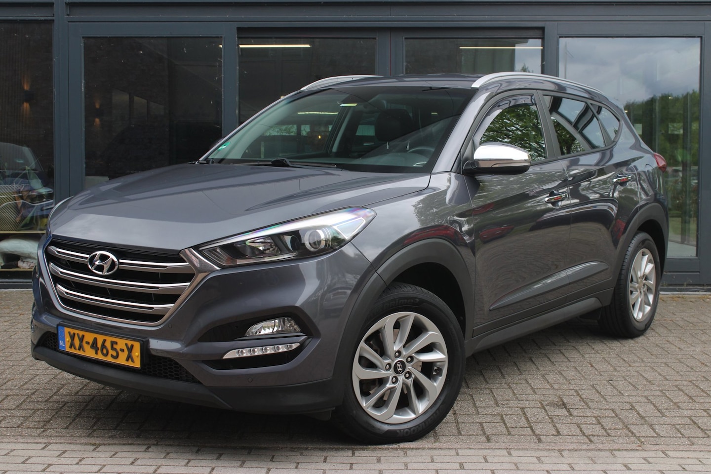 Hyundai Tucson - 1.6 GDi Comfort | Stoelverwarming | Keyless | Cruise-control | Telefoonvoorbereiding | - AutoWereld.nl