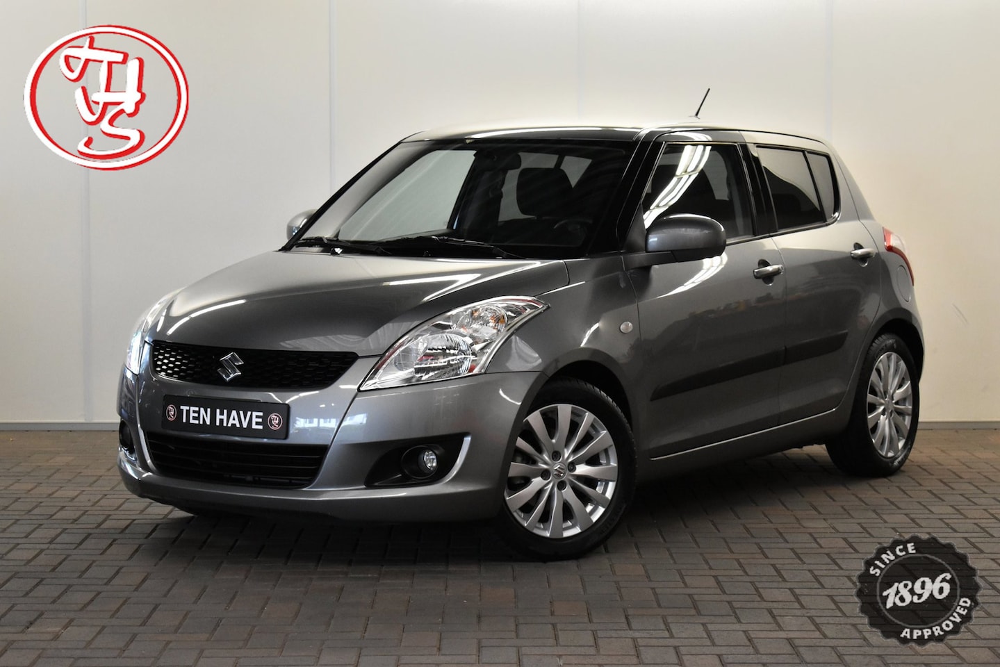 Suzuki Swift - 1.2 Exclusive CLIMATE CONTROL|TREKHAAK|ALL-SEASON BANDEN|STOELVERWARMING|CRUISE CONTROL|BL - AutoWereld.nl