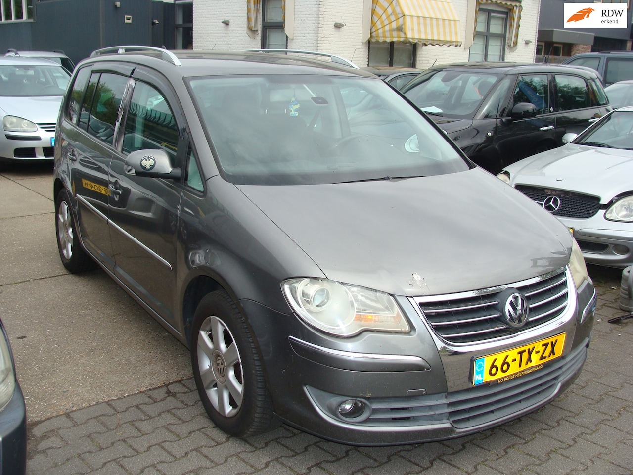 Volkswagen Touran - 1.4 TSI Highline Business airco elek pak nap apk - AutoWereld.nl