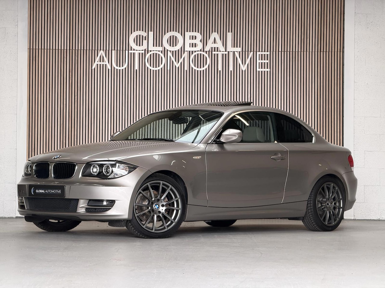 BMW 1-serie Coupé - 128i - schuifdak - leer - memory - AutoWereld.nl