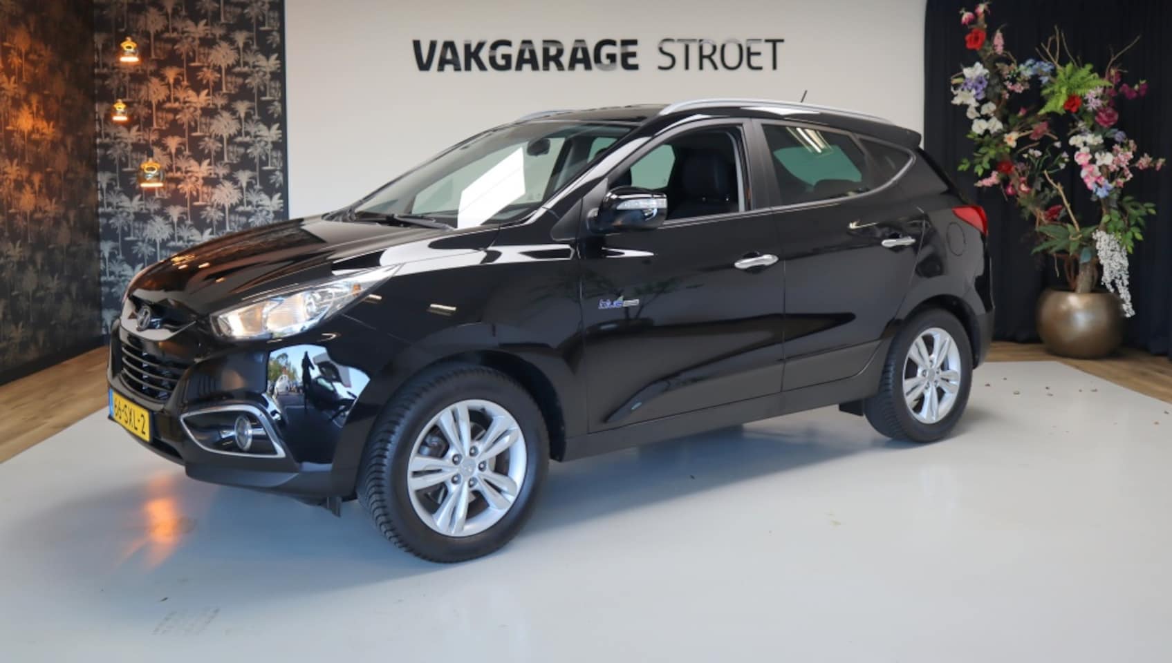 Hyundai ix35 - 1.6i GDI Style | cruise | half leer | trekhaak | 1e eigenaar - AutoWereld.nl