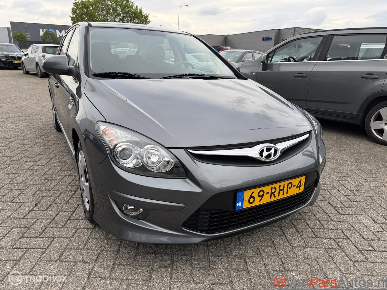 Hyundai i30 - 1.4i i-Drive Cool 1.4i i-Drive Cool,Airco,5drs - AutoWereld.nl