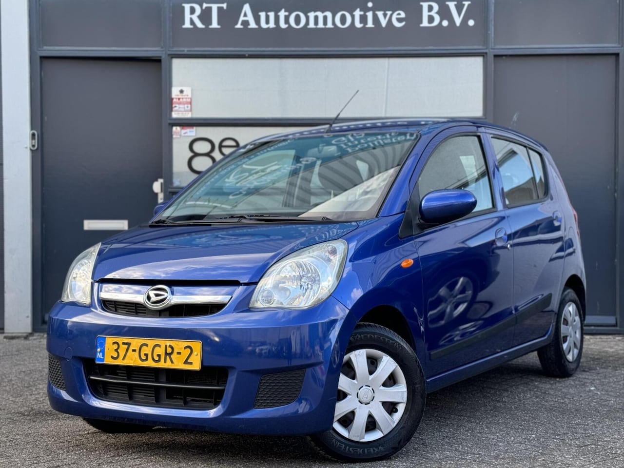 Daihatsu Cuore - 1.0 Premium Airco / APK 04/2027 - AutoWereld.nl