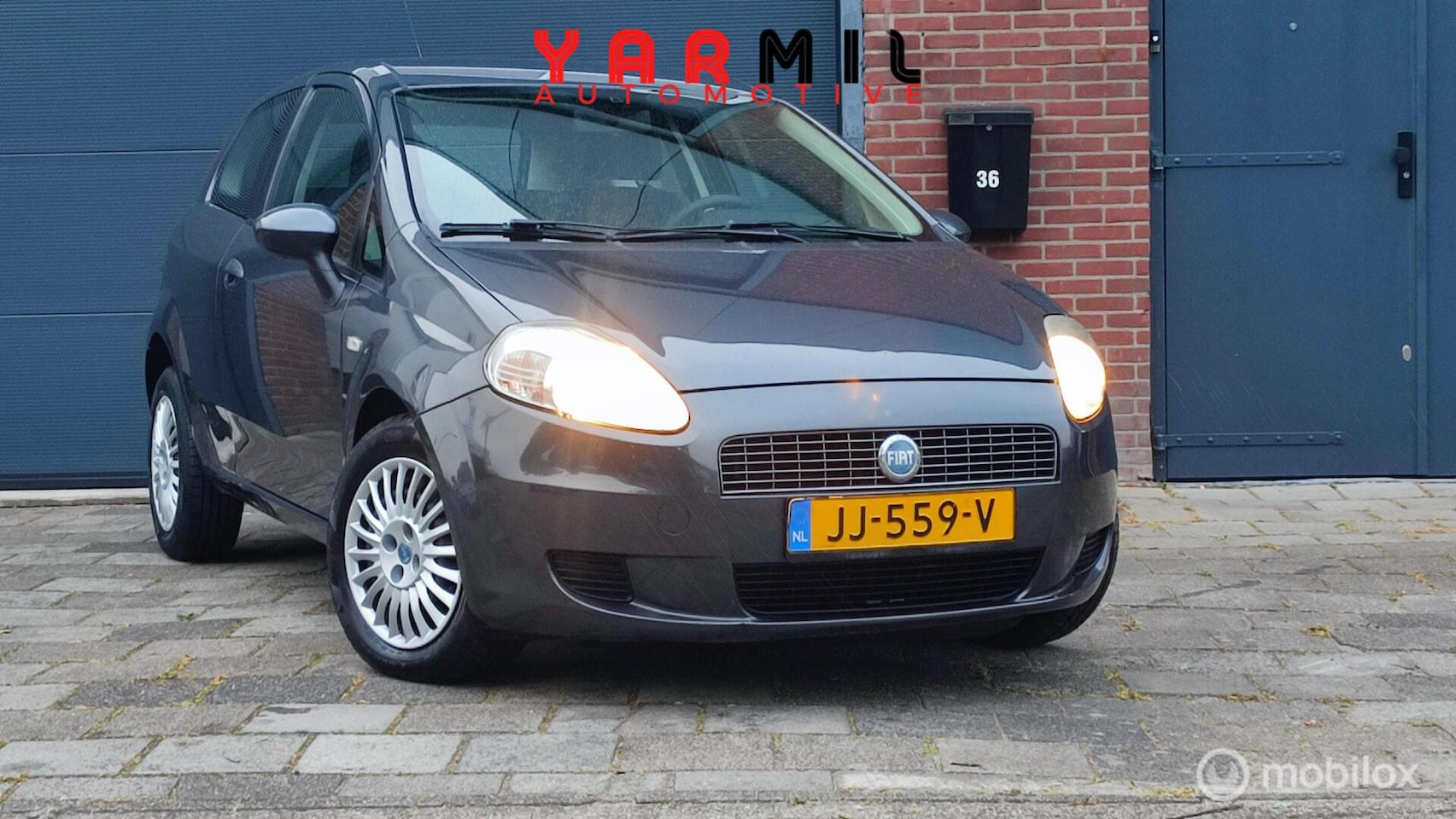 Fiat Grande Punto - 1.4 Active ZUINIG AIRCO NETTE WAGEN - AutoWereld.nl