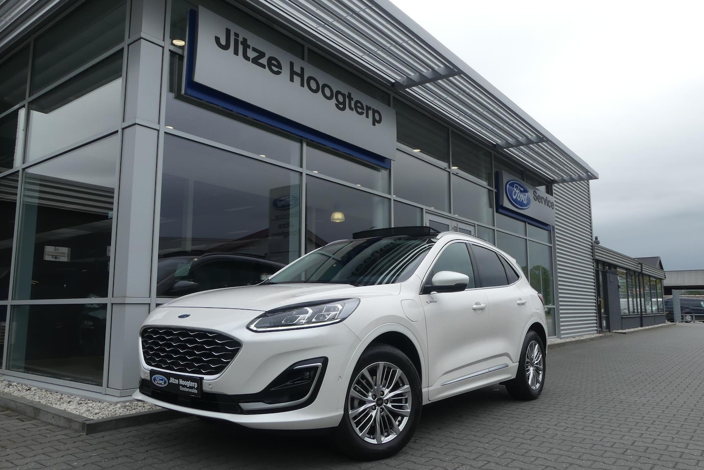 Ford Kuga - 2.5 PHEV Vignale ELEKT. TREKHAAK (1.500KG), PANO, MEMORY, WINTER PACK, ADAPT. CRUISE, CLIM - AutoWereld.nl