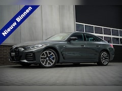 BMW i4 - M50 84 kWh 544 pk M-Sportpakket / BTW-Auto/ Dravitgrau/ Harman&Kardon/ Keyless/ Led-Koplam
