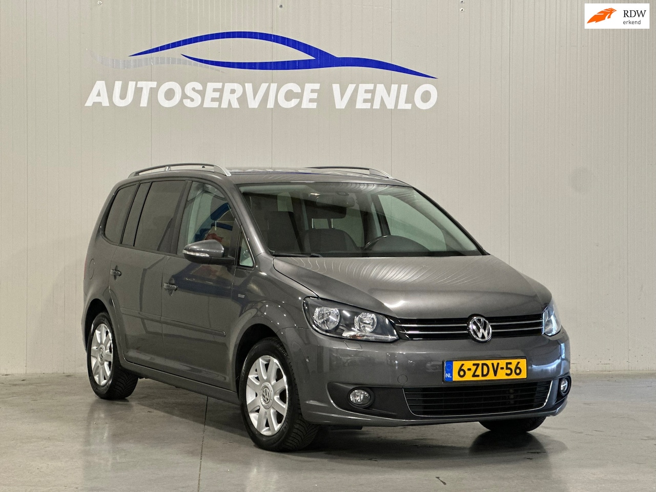 Volkswagen Touran - 1.6 TDI Comfortline BlueMotion 7persoons Life Edition - AutoWereld.nl