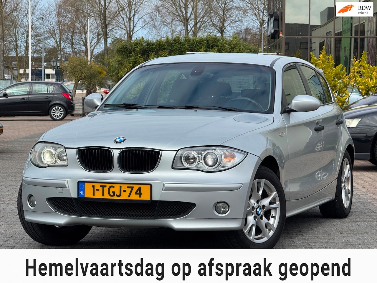 BMW 1-serie - 118i | NW Distributtieketting | Stoelverwarming | Climate control | Parkeersensoren | Xeno - AutoWereld.nl
