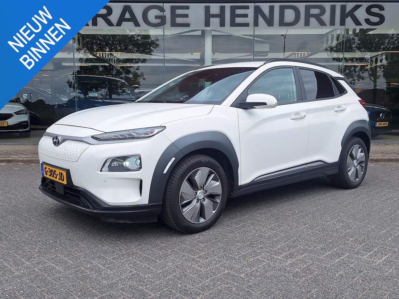 Hyundai Kona Electric - EV Premium 64 kWh | SOH: nnb | Warmtepomp | Lage km-stand | Leder | HUD | Blindspot | Full - AutoWereld.nl