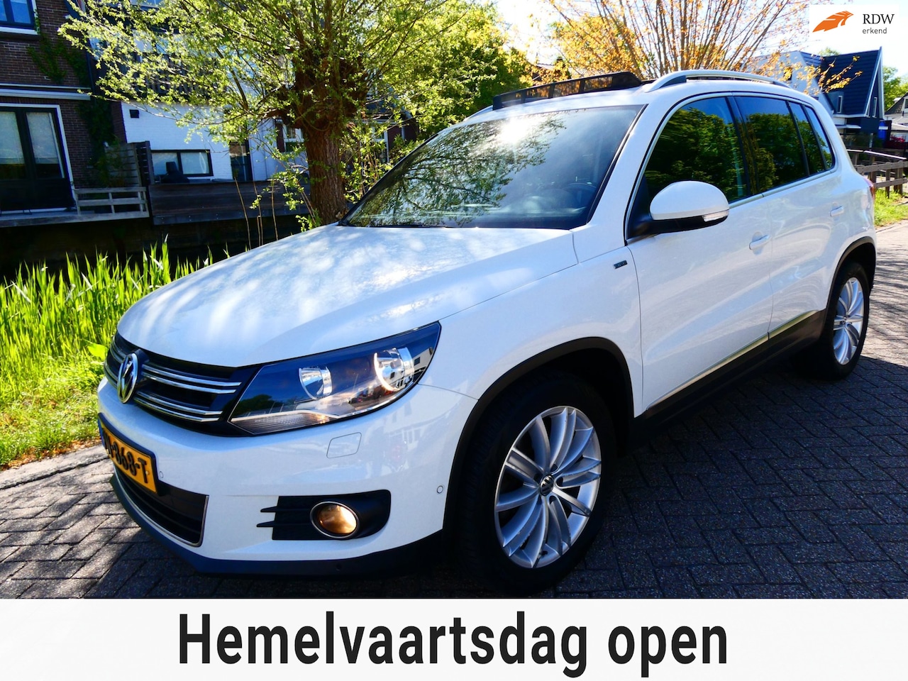 Volkswagen Tiguan - 1.4 TSI R-Line 122pk 2e eig. Clima Navi PDC Pano Xenon - AutoWereld.nl
