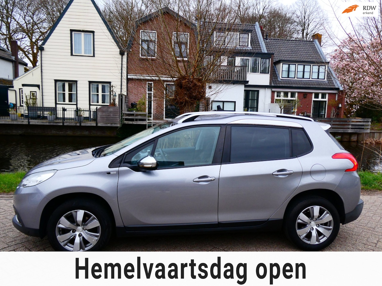 Peugeot 2008 - 1.2i Active 132.000km. 2e eig. Clima Cruise Navi Trekhaak 1100kg. - AutoWereld.nl