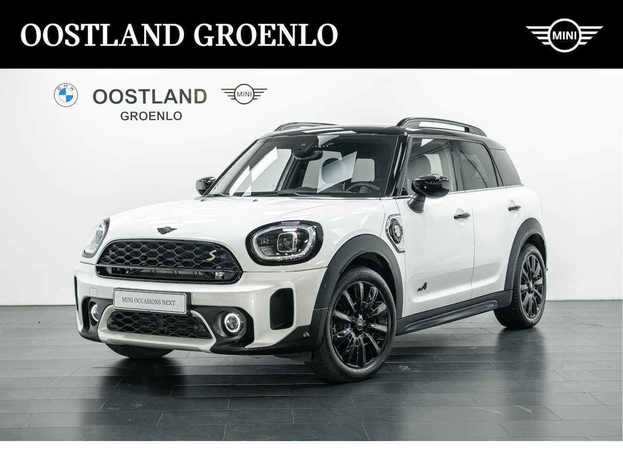 MINI Countryman - Cooper S E ALL4 Essence / Panoramadak / Comfortstoelen / Comfort Access / Active Cruise Co - AutoWereld.nl