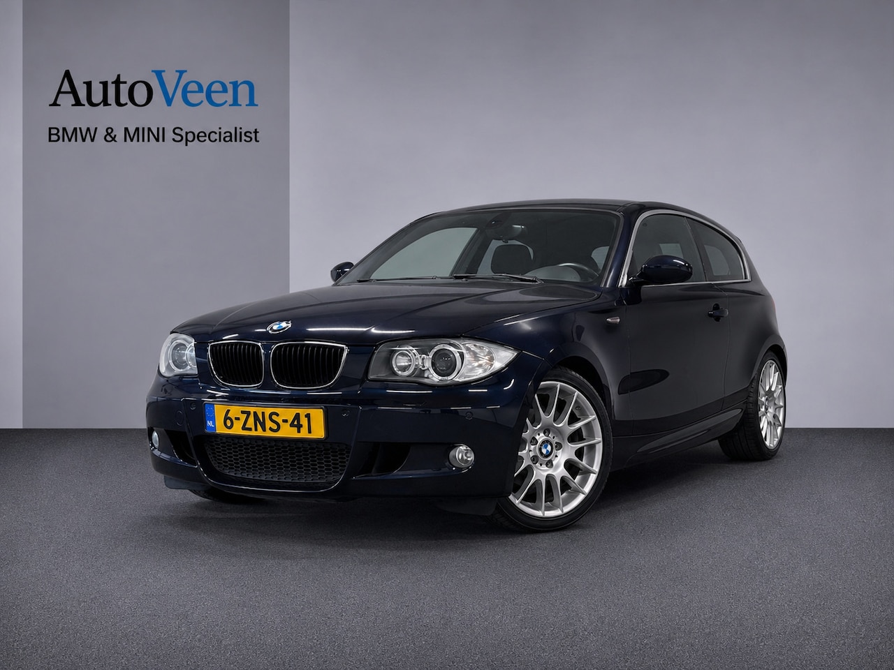 BMW 1-serie - 120i M Sport 120i (M-SPORT, STOELVERWARMING, HALF LEDER, AIRCO, GOED ONDERHOUDEN) - AutoWereld.nl