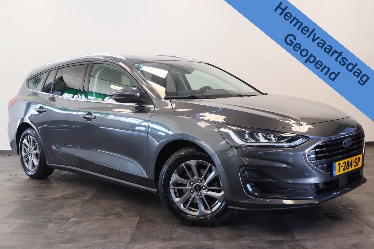 Ford Focus Wagon - 1.0 EcoBoost Hybrid Titanium Cruise/Climate Keyless Trekhaak NAP * Hemelvaartsdag geopend - AutoWereld.nl