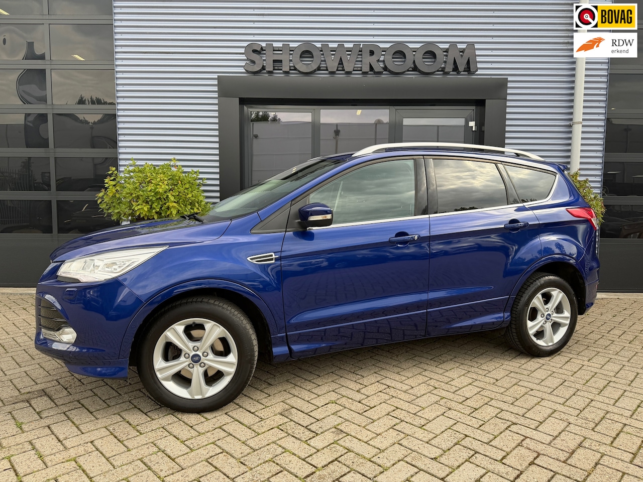 Ford Kuga - 1.5 Titanium Plus Trekhaak|Dodehoek|Electrische Stoelen|Leer|Cruise - AutoWereld.nl