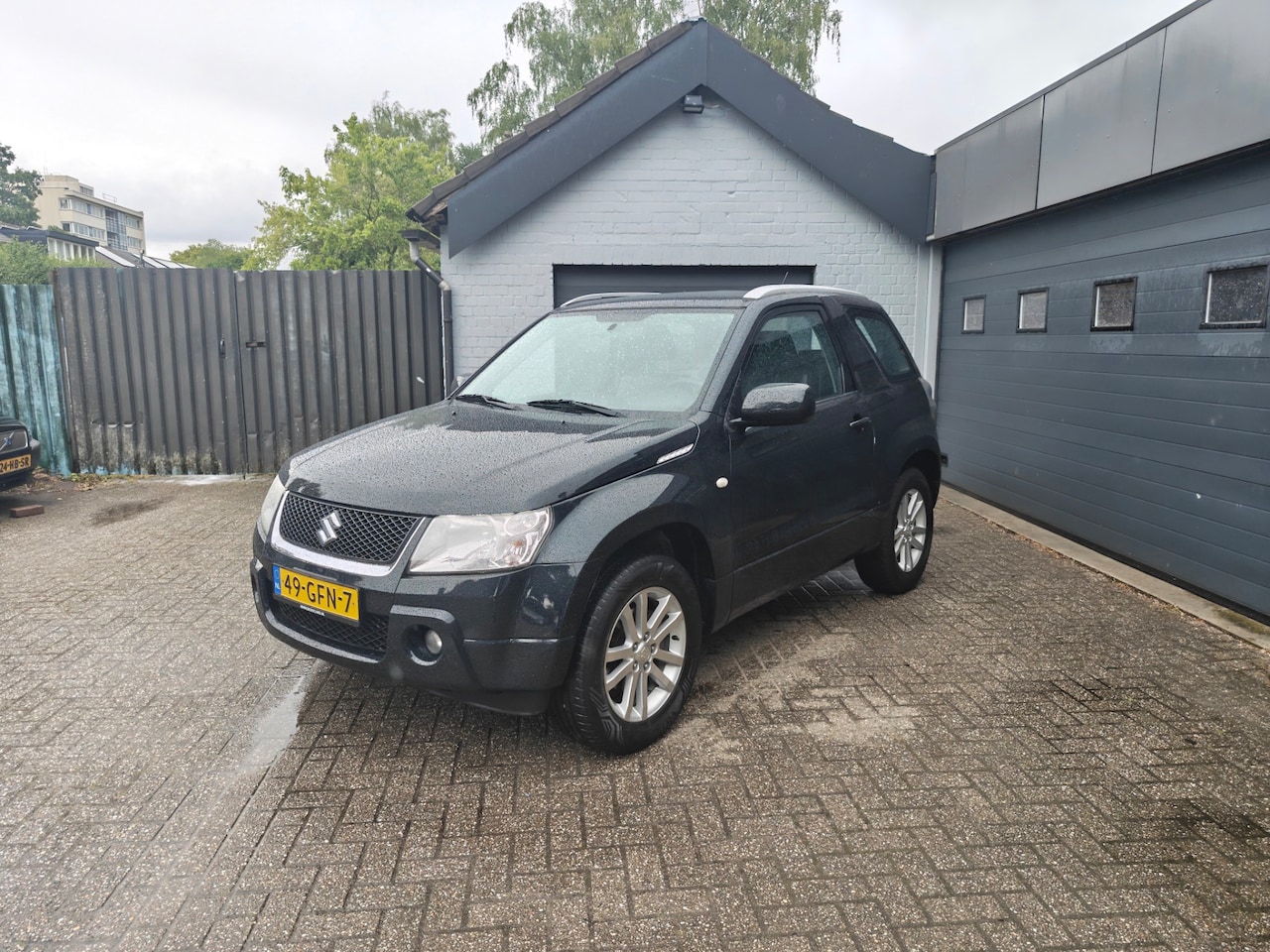 Suzuki Grand Vitara - 1.6-16V High Executive 1.6-16V High Executive,AWD,Airco,Radio met stuur bediening,Lichtmetalen velgen - AutoWereld.nl