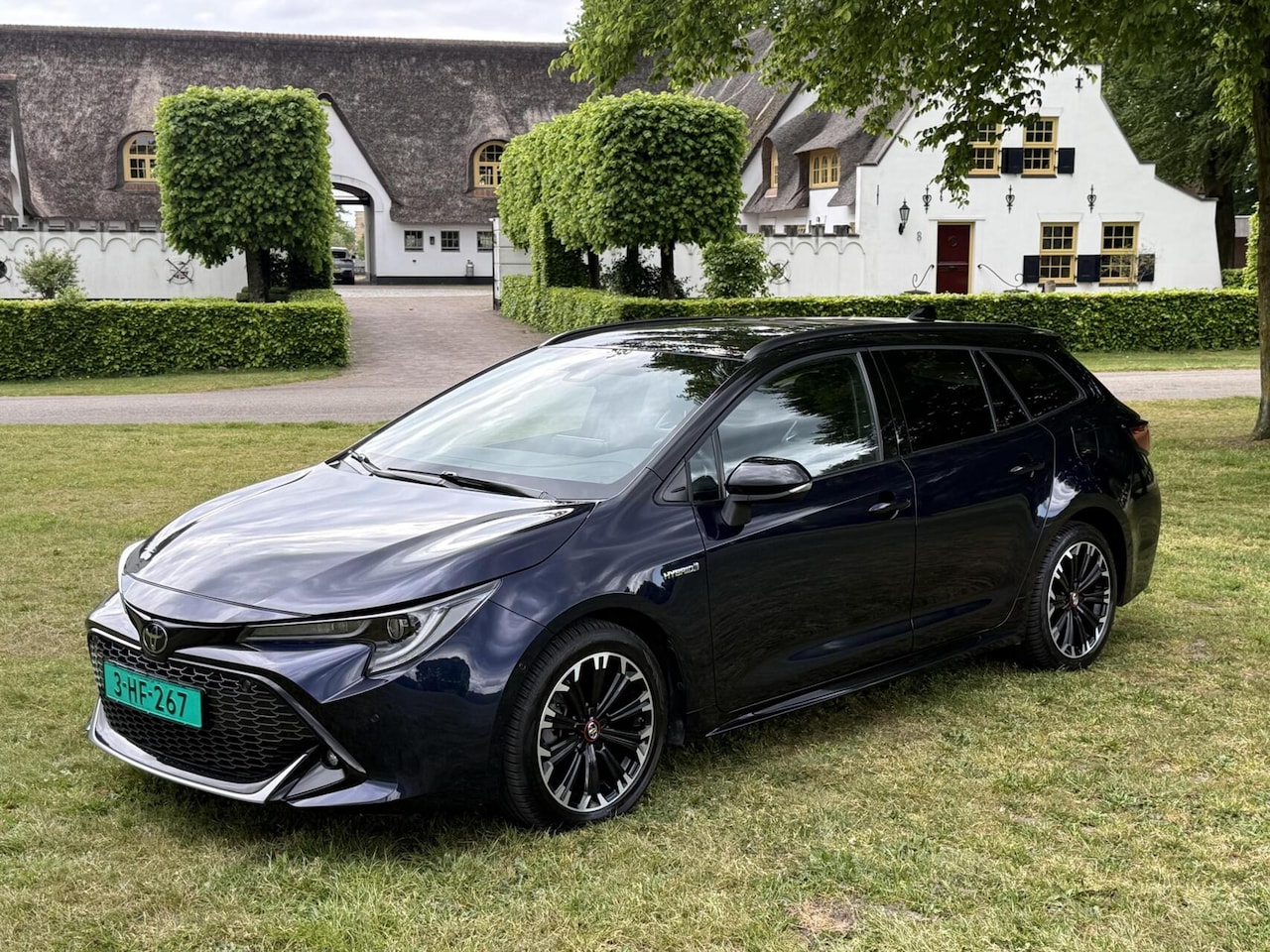 Toyota Corolla Touring Sports - 1.8 Hybrid GR Sport 1e Eigenaar - AutoWereld.nl