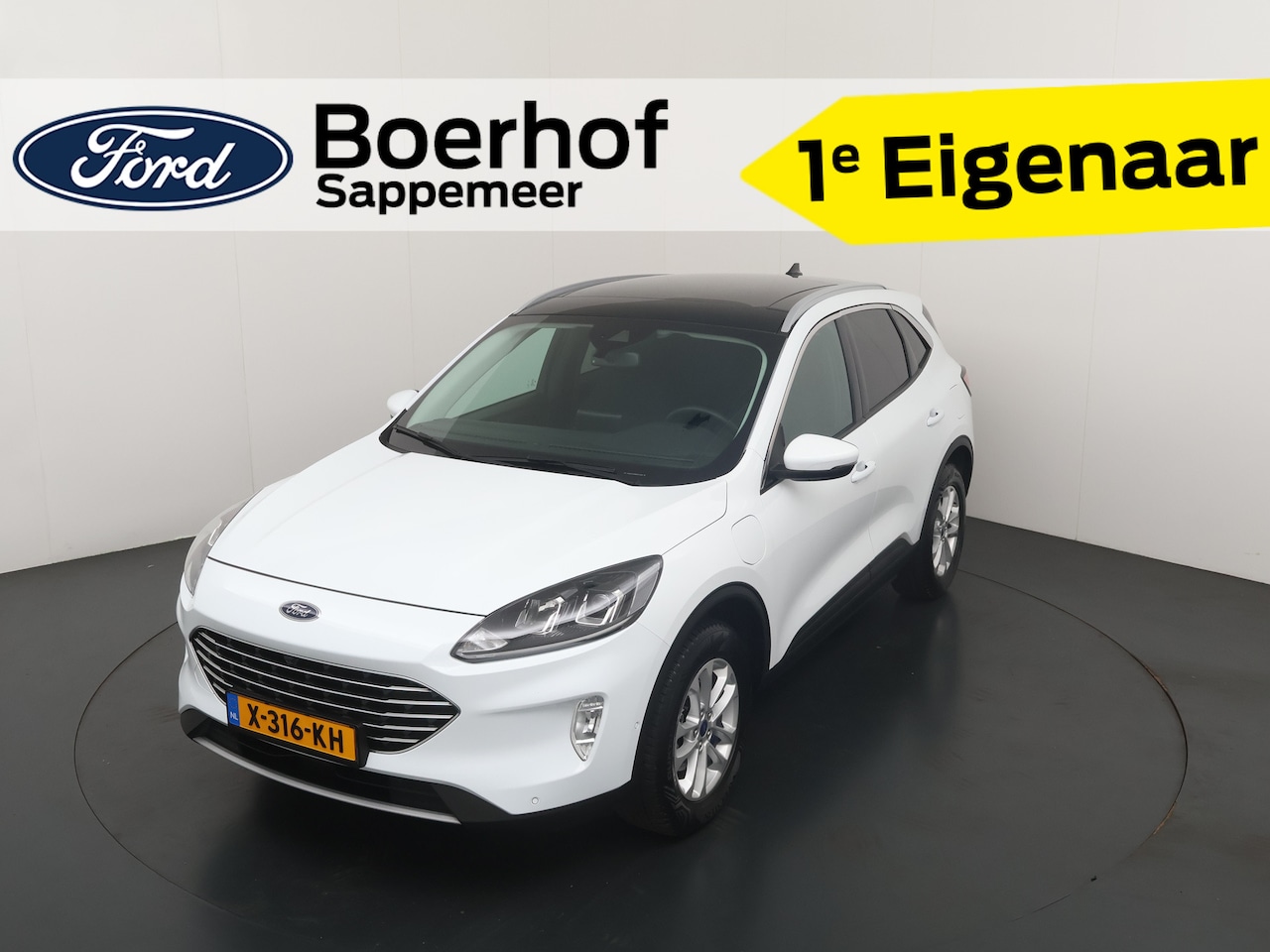 Ford Kuga - 2.5 PHEV 225 pk Titanium | Trekhaak | Pano | Camera's | Adapt. cruise | 4 seiz. banden | 1 - AutoWereld.nl