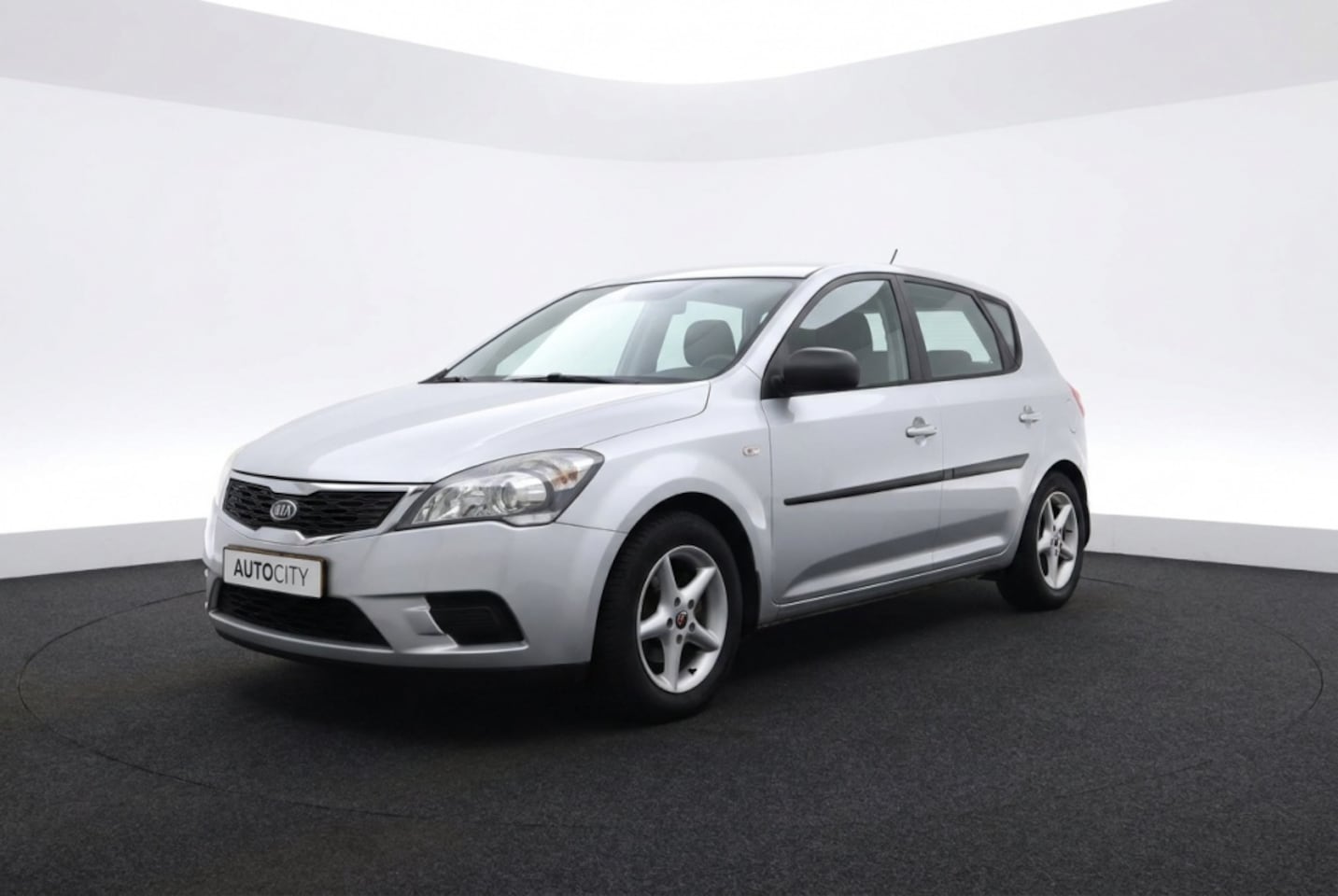 Kia Cee'd - 1.4 CVVT X-tra Cruise l Climate l Airco - AutoWereld.nl