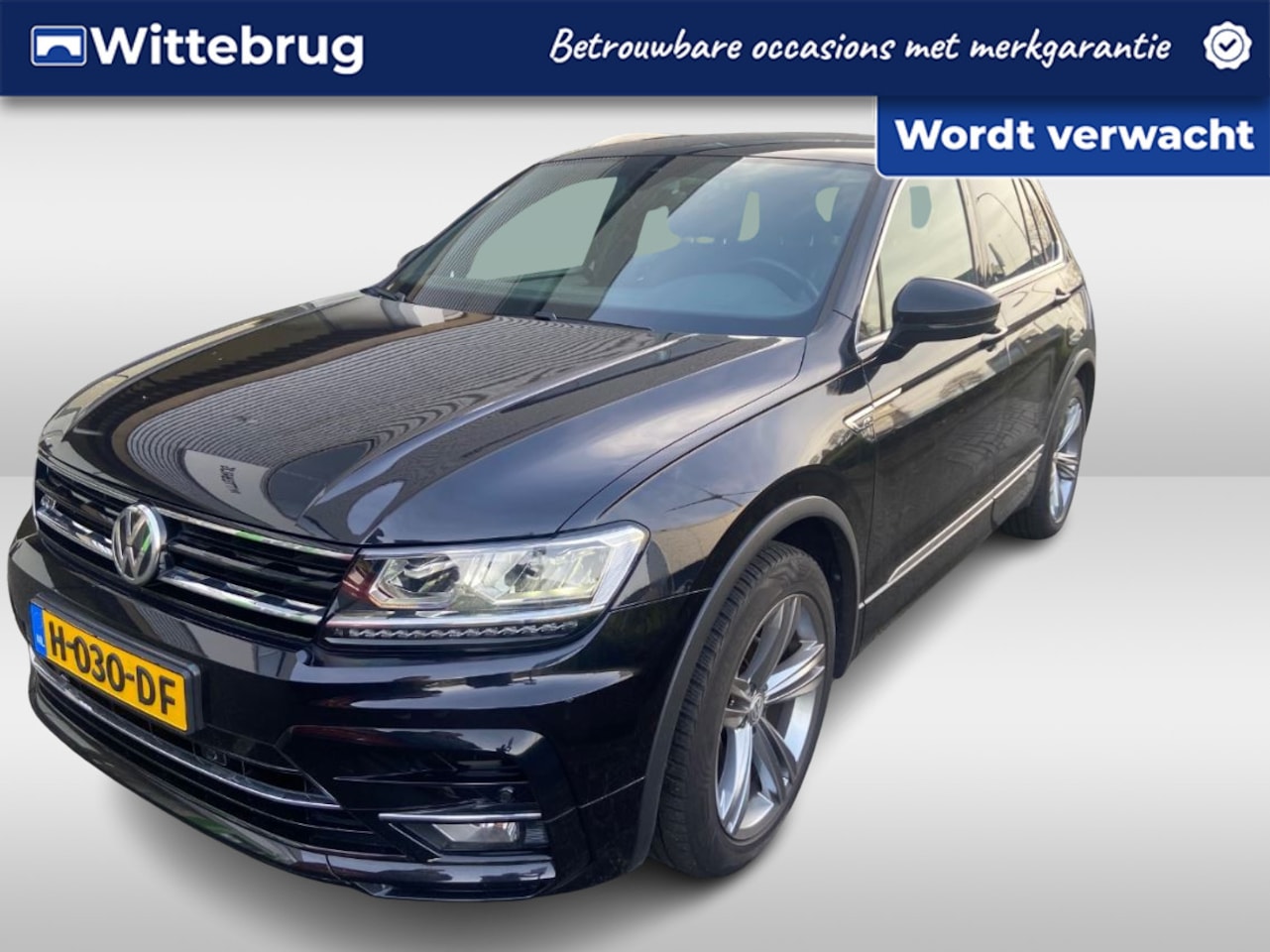 Volkswagen Tiguan - 1.5 TSI Comfortline Business R / R-line exterieur / Navi / Trekhaak wegklapbaar - AutoWereld.nl