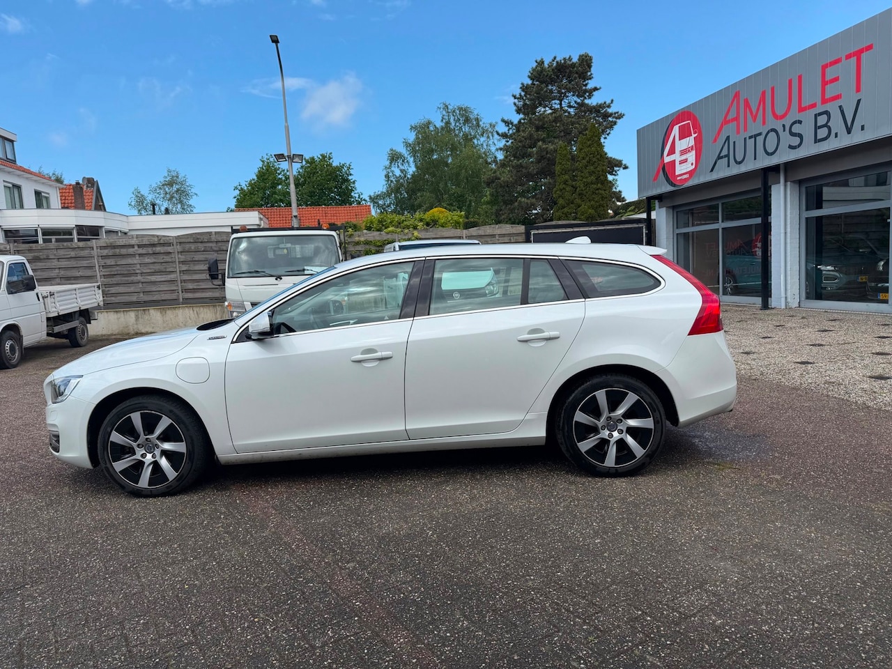 Volvo V60 - 2.4,D6, AWD Plug-In Hybrid Summum,3-2014 - AutoWereld.nl