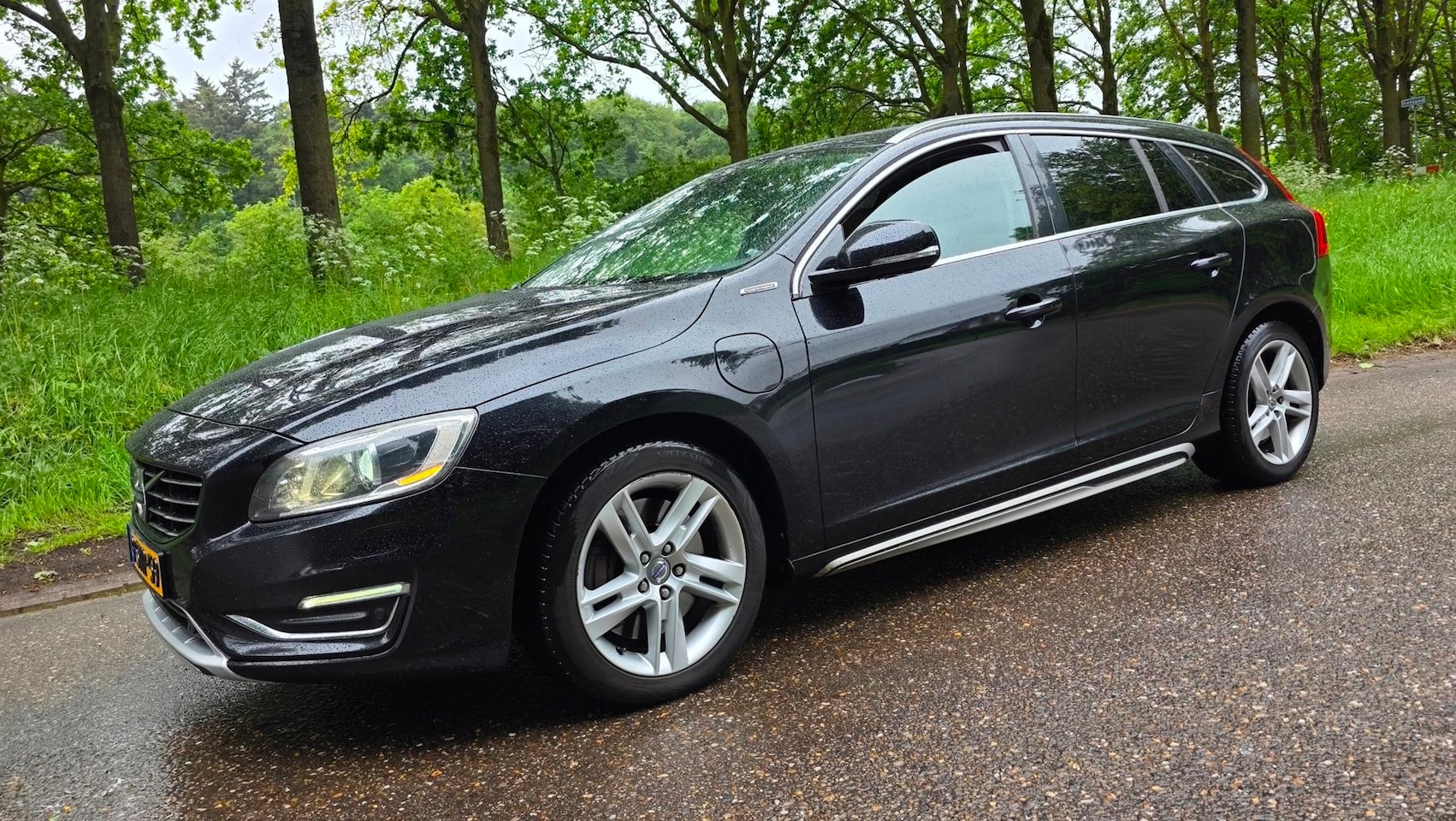 Volvo V60 - 2.4 D6 AWD Plug-In Hybrid Summum Full Options - AutoWereld.nl