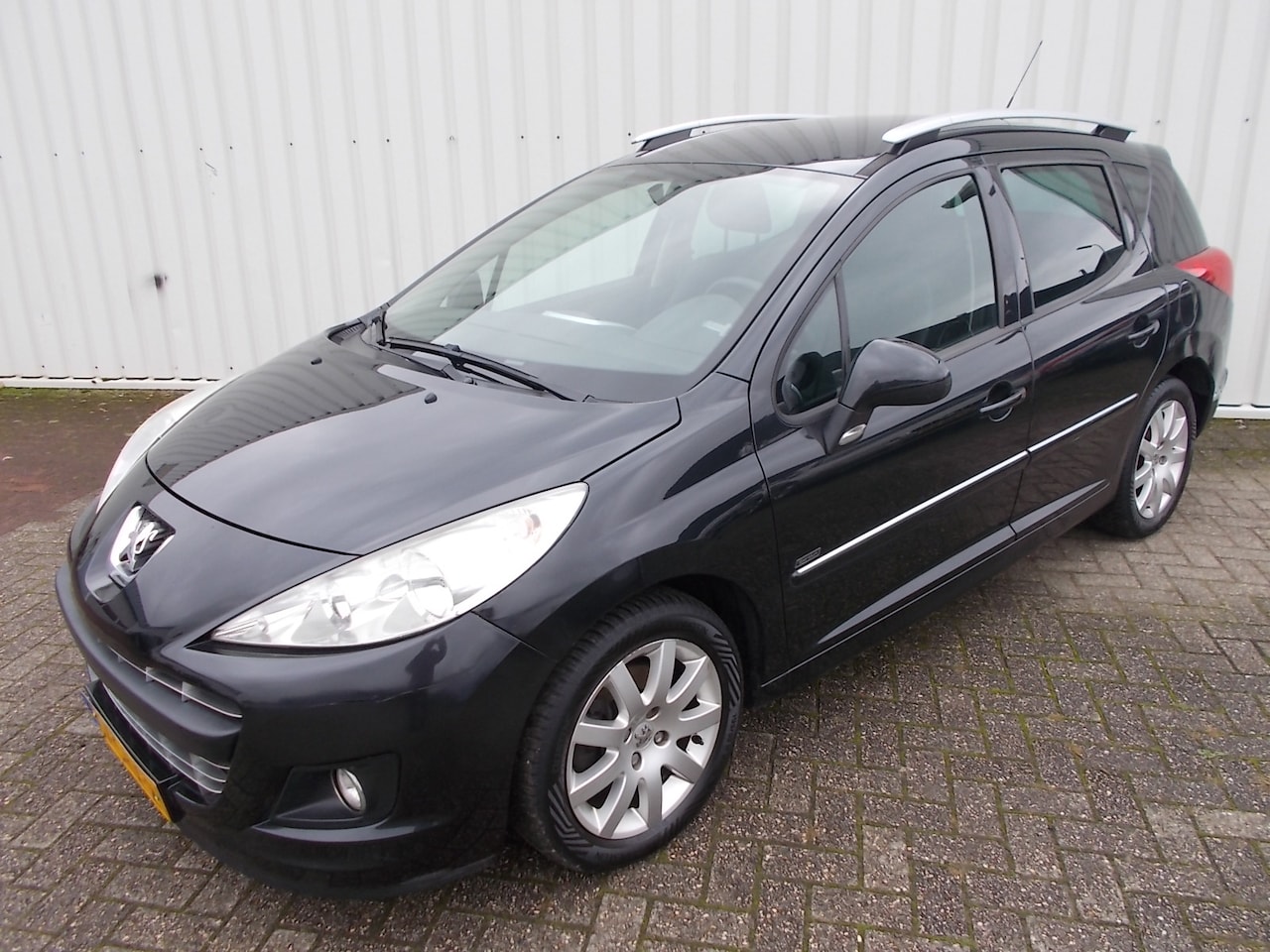 Peugeot 207 SW - 1.6 VTi Sportium 1.6 VTi Sportium ( APK 20-05-2026 ) - AutoWereld.nl
