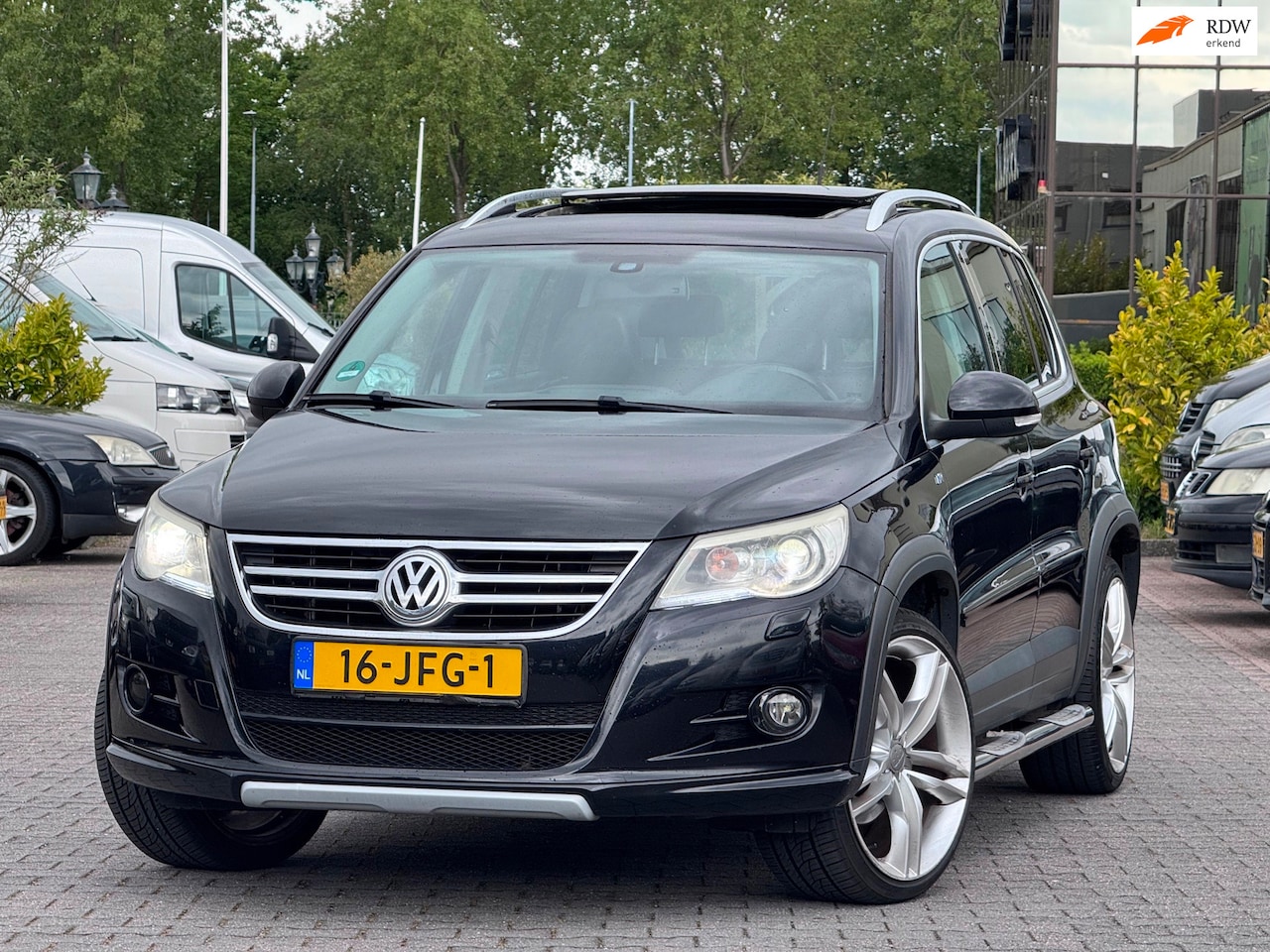 Volkswagen Tiguan - 1.4 TSI Sport&Style 4Motion | Panoramadak | Elektrische sportstoelen met leder | Achteruit - AutoWereld.nl