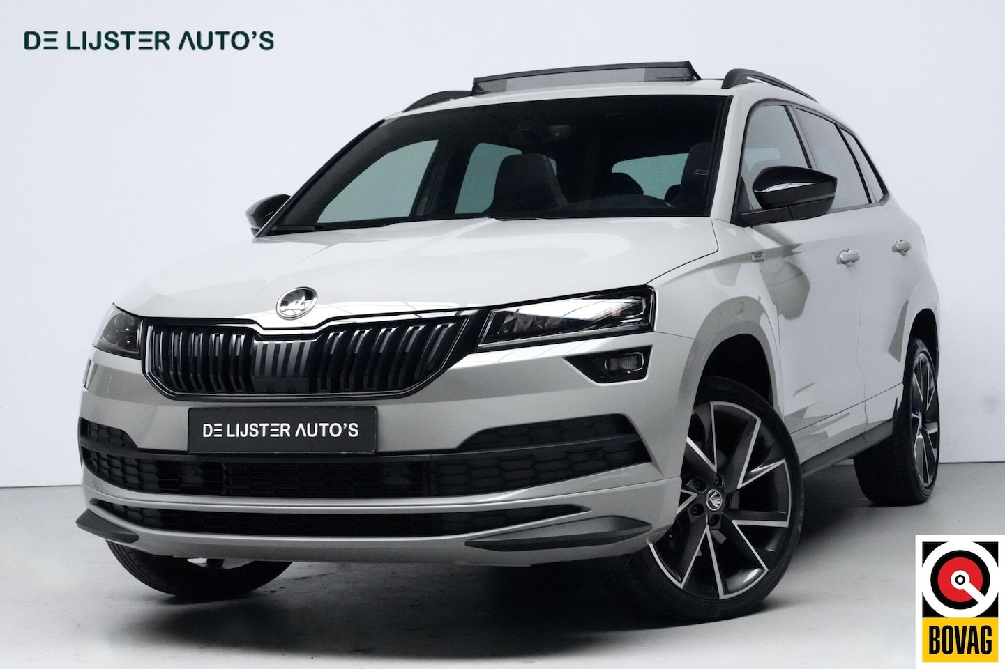 Skoda Karoq - 1.5 TSI ACT Sportline Automaat | Pano-dak | CarPlay | Acc | Camera | Stoelverwarming | Pdc - AutoWereld.nl