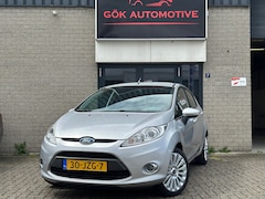 Ford Fiesta - 1.4 Titanium /2De Eigenaar / Voorruit Verwarming / NAP / Clima / Automaat / PDC / LM Velge