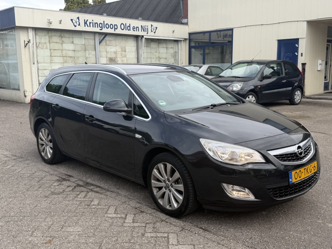 Opel Astra Sports Tourer - 1.4 Cosmo AIRCO NAVI - AutoWereld.nl